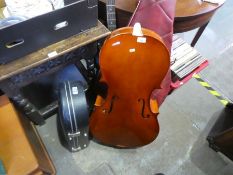 Collection musical instruments including Cello AF, bass guitar, etc