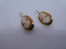 18ct yellow gold drop earrings set with cameos, marked 750