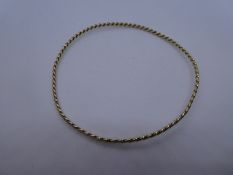 9ct yellow gold twist design bangle, AF, misshapen, marked 375, approx 5.8g