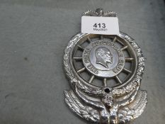 A car badge for 'The Royal Automobile Club'