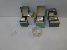 A quantity of five silver napkin rings, all hallmarked, 4.80ozt approx