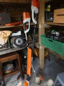 A quantity of battery STIHL equipment to include hedge trimmer, strimmer, chainsaw, and a box of saf