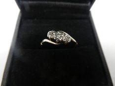 Yellow gold and platinum diamond trilogy ring, marked 'PLAT' size T, central diamond approx 0.5 CARA