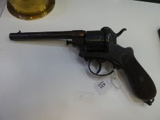 A 19th century pinfire revolver having wooden grip