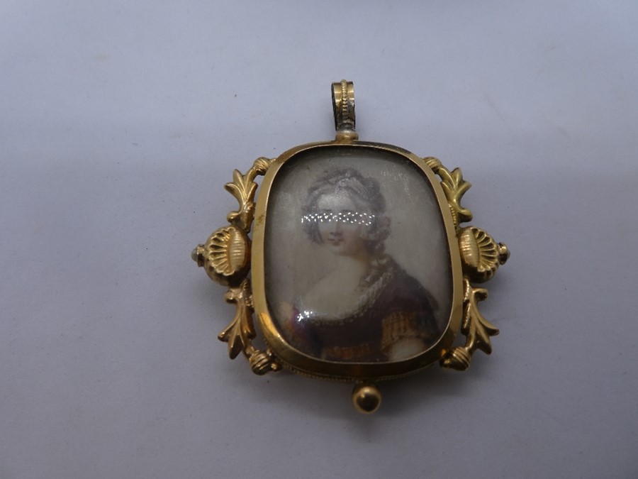 Antique pretty yellow metal - marks worn - pendant encasing a miniature picture of a lady, 5cm x 4.5