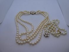 Pretty simulated pearl triple strand necklace and bracelet with 9ct yellow gold clasps, marked 375