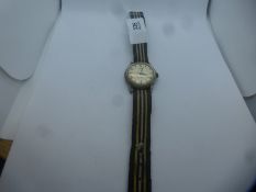 A vintage military Romer wrist watch - winds and ticks