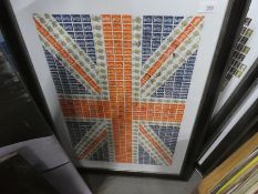 Stamp art pictures, framed and glazed and a box of mixed stamps and a snooker cue