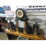 Antique slate and marble case mantle clock with brass and enamel dial, with matching plinths