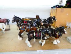 Two Beswick Shire horses pulling Whitbread wagon, a similar Beswick Shire horse and others