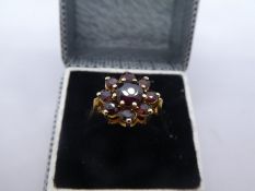 9ct yellow gold garnet set cluster ring, size Q/R, 3.3g