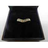 Yellow gold wishbone design ring, set with 7 round cut diamonds, marks worn, size O