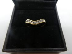 Yellow gold wishbone design ring, set with 7 round cut diamonds, marks worn, size O