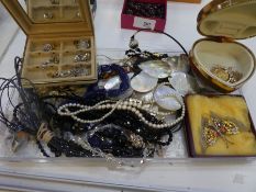 Tray of various costume jewellery including silver brooches, shell necklace, butterfly brooch, etc