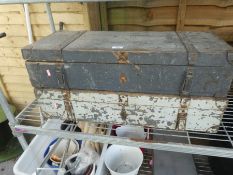 Two wooden storage trunks