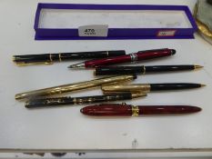 A Waterman Rollerball and pencil set and sundry pens