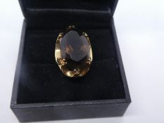 Pretty 9ct yellow gold dress ring with oval faceted Smoky Topaz, marked 375 Size N