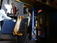 Box of various paperweights and model cars