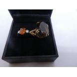 9ct yellow gold dress ring set with oval smoky topaz, size S/T, marked 375 together with a yellow g