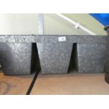 3 connected plant tubs