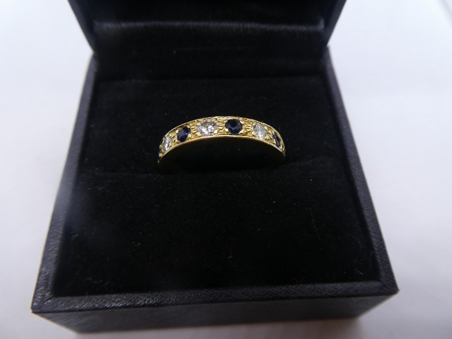 18ct yellow gold Sapphire and diameter band ring, size P, weight approx 4.5g, marked 750