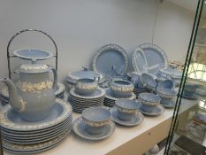 A quantity of Wedgwood 'Etruria' embossed pale blue dinner and teaware