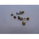 Collection of 9ct yellow gold earrings to include turquoise and moonstone set example