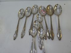 A set of six silver dessert spoons hallmarked Sheffield 1971, Cooper Brothers and Sons Ltd. Along wi