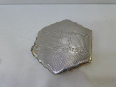 A foreign silver compact hallmarked BS900, very ornate and decorative design with foliate pattern, g