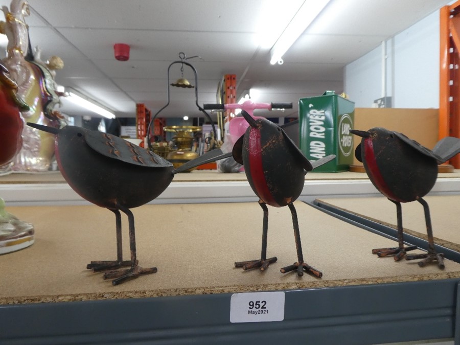 Three tinplate robins