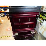 Two matching cherry wood drop handle two drawer bedside cabinets, trays and silver plated chargers