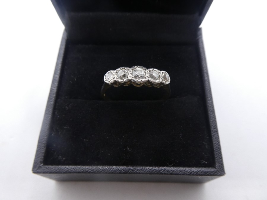 18ct and platinum graduated 5 stone illusion set diamond ring, marked '8ct PT' marks worn, size U, c