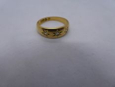 18ct yellow gold gypsy ring set 3 diamonds, marked 18, size K, approx 2.7g