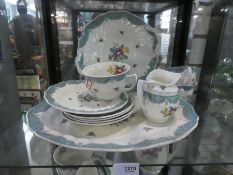 2 shelves of Royal Doulton 'Lowestoft Bouquet' tea and dinnerware