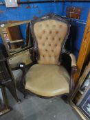 Mahogany framed button back leather effect armchair