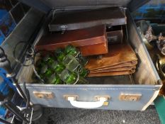 A vintage suitcase to include a metal carry container with green glasses, leather satchels and cases