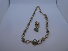 9ct yellow gold necklace and drop earring set of attractive design inset with blue stones, possible