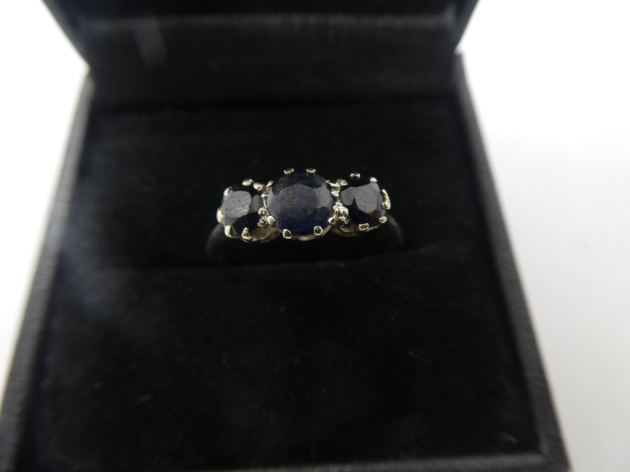 Unmarked white gold three stone Sapphire set ring, size U, gross weight approx 2.5g - Image 2 of 2