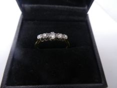 18ct and platinum graduated 5 stone diamond ring, marked '18 + PLAT' size T, central diamond approx