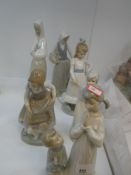Two Lladro figures and four Nao examples
