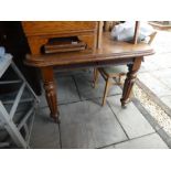 Square wooden wind out dining table and a drop leaf table and bookcase