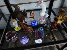 Selection of glass paperweights and animal figures