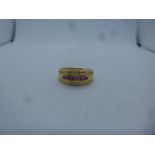 14K yellow gold band ring Channel set rubies, not diamonds, marked 585, 4.8g approx, marked 585