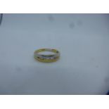 Pretty two tone 18ct gold split ring, inset with 7 graduated diamonds, size L/M, marked 750, 2.8g ap