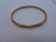 9ct rose gold bangle etched with Greek key design, maker A J, approx 8cm diam, marked 375, approx 8.