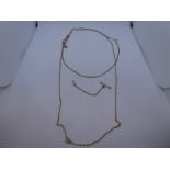 9ct yellow gold neckchain, marked 375, marked 9ct and another yellow metal example, lot weight