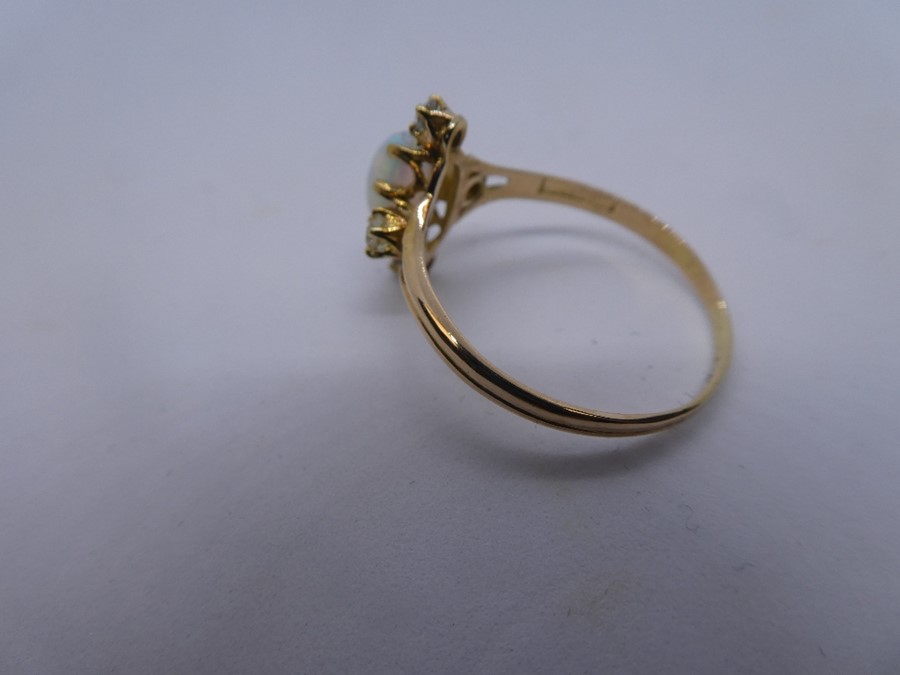 Yellow gold dress ring set with central cabochon opal on 4 approx 0.05 carat diameter, size T - Image 3 of 3