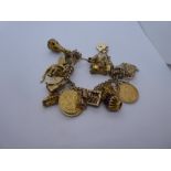 9ct yellow gold charm bracelet with heart shaped clasp and safety chain, hung with 24 charms to incl
