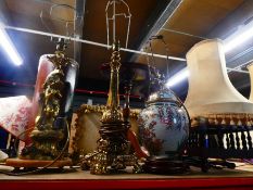 Shelf of various table lamps incl. Oriental and brass etc