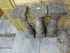 Three stone effect garden plinths